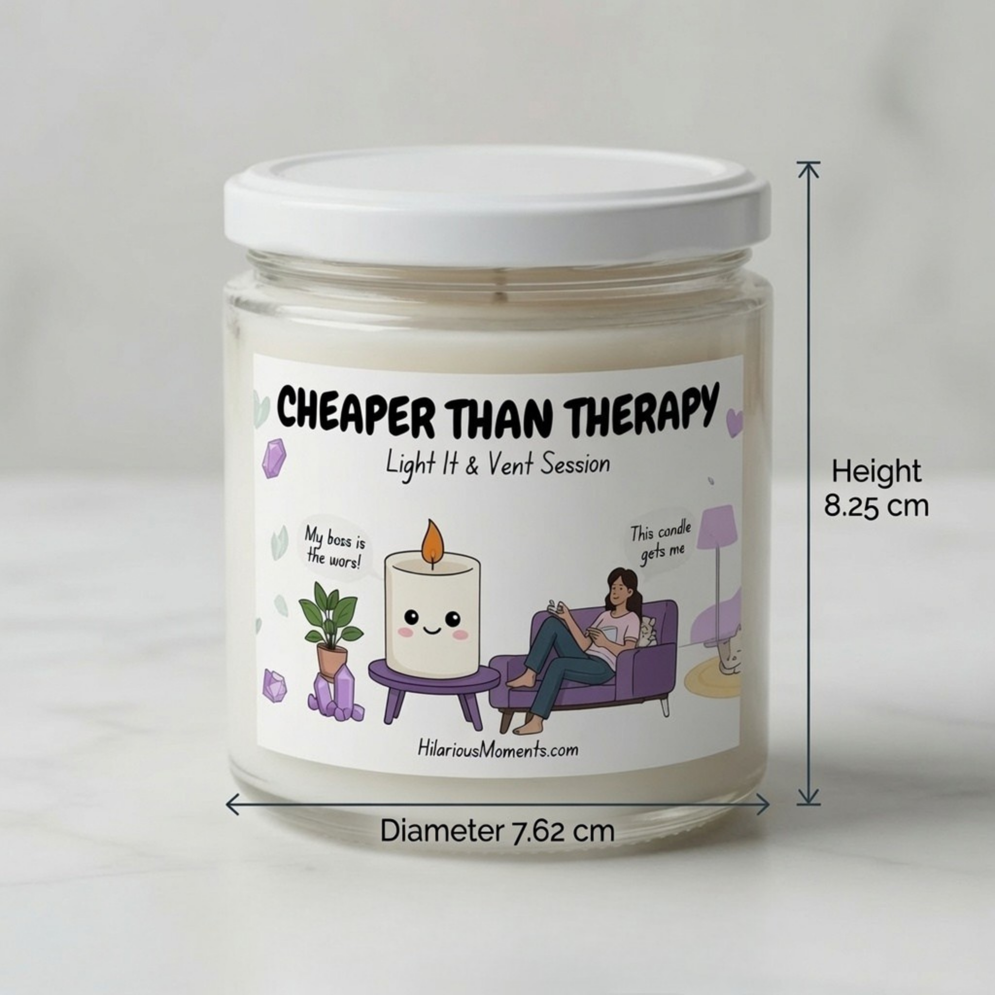 A glass jar candle with a white lid and a white label featuring a cartoon illustration and the text 'CHEAPER THAN THERAPY Light H & Vent Session.' Measurement arrows and labels indicate a height of 8.